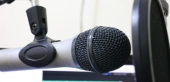 Turn on a podcast to unwind before sleeping.