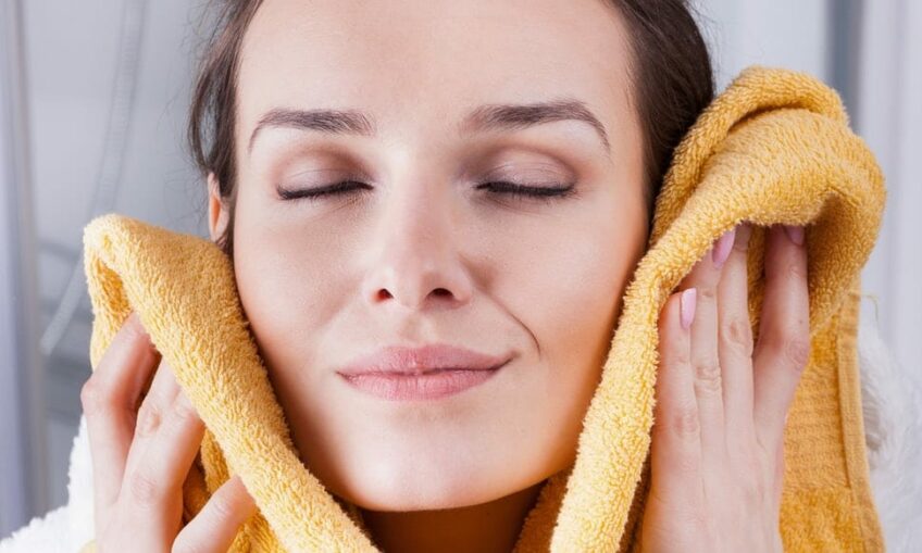 Relax by putting a hot towel on your face for a few